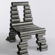 Illustration for article titled British Designer Makes Insane Looking Chairs Out of Hard-To-Recycle Trash